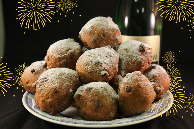 Afbeelding van Oliebollen met rozijnen 10 + 2 gratis